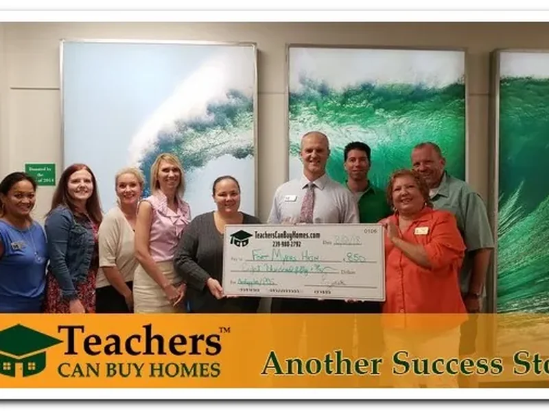 Principal Butz with Fort Myers high Accepts another donation!